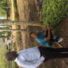 speaking with teacher on their tree nursery project